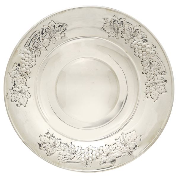 Plate with embossed decorations of leaves and fruits