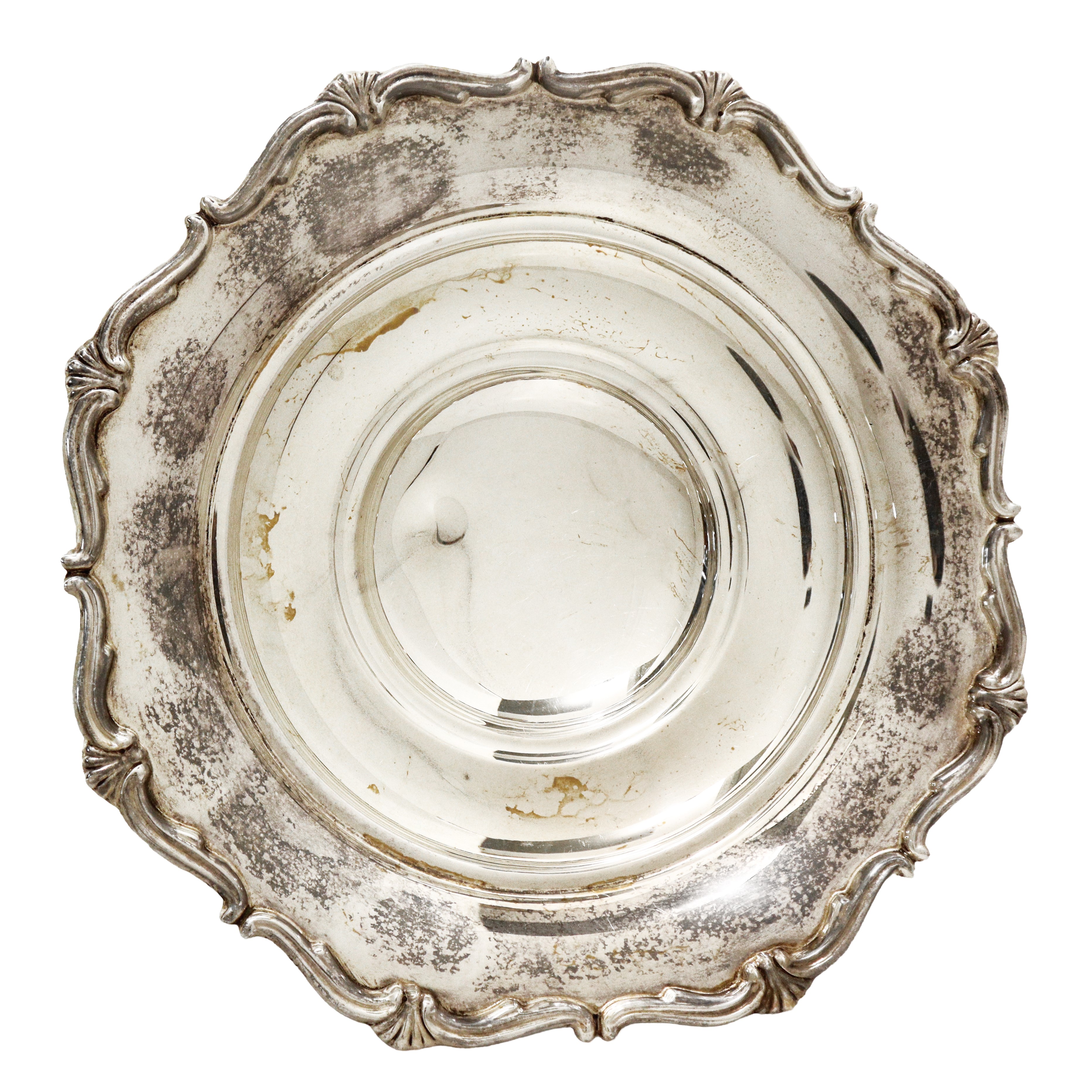 Piccolo portadolci con bordo smerlato e piedi con motivi ornamentali