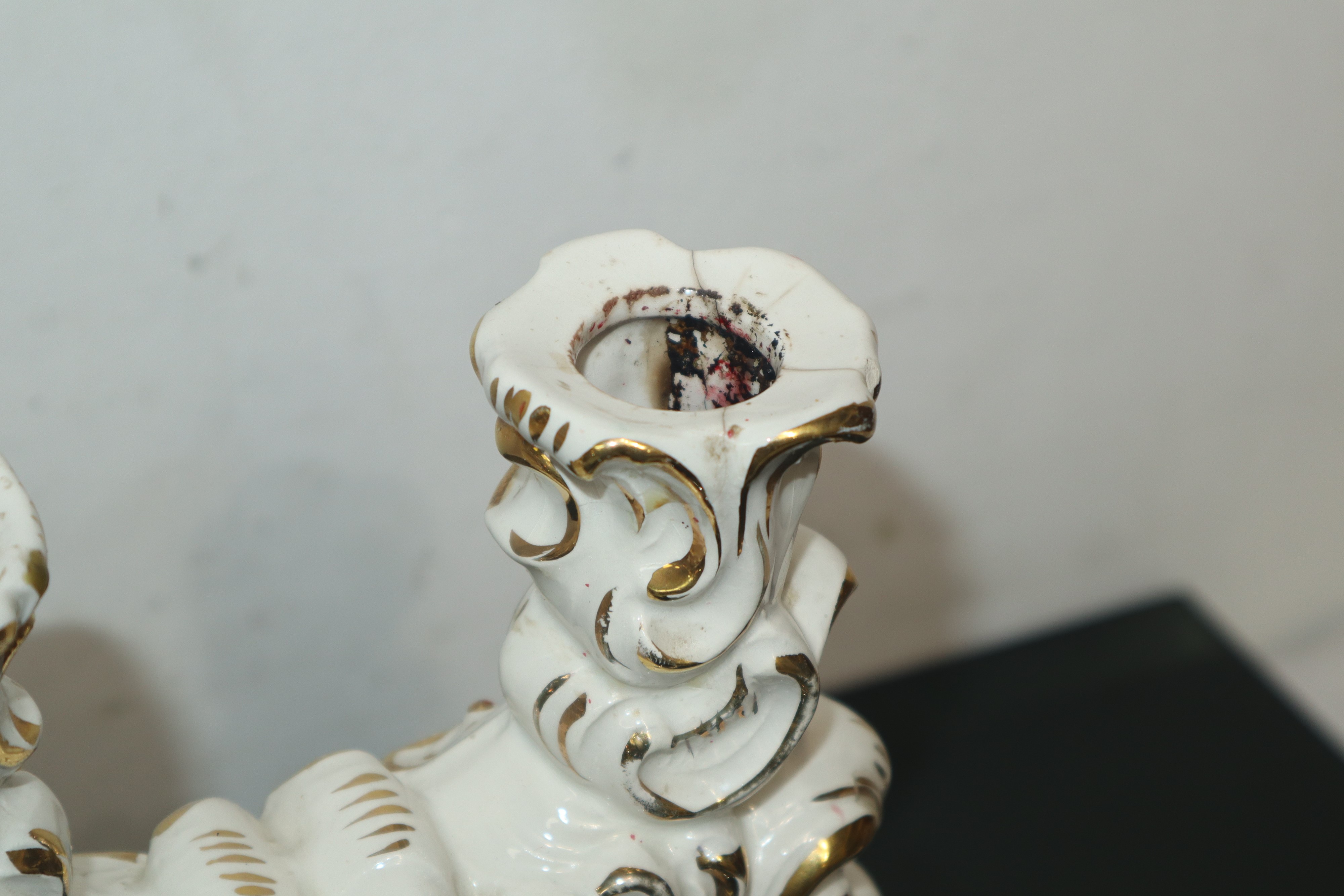 Capodimonte - Candelabro in maiolica policroma e dorata a due luci con personaggi mitologici