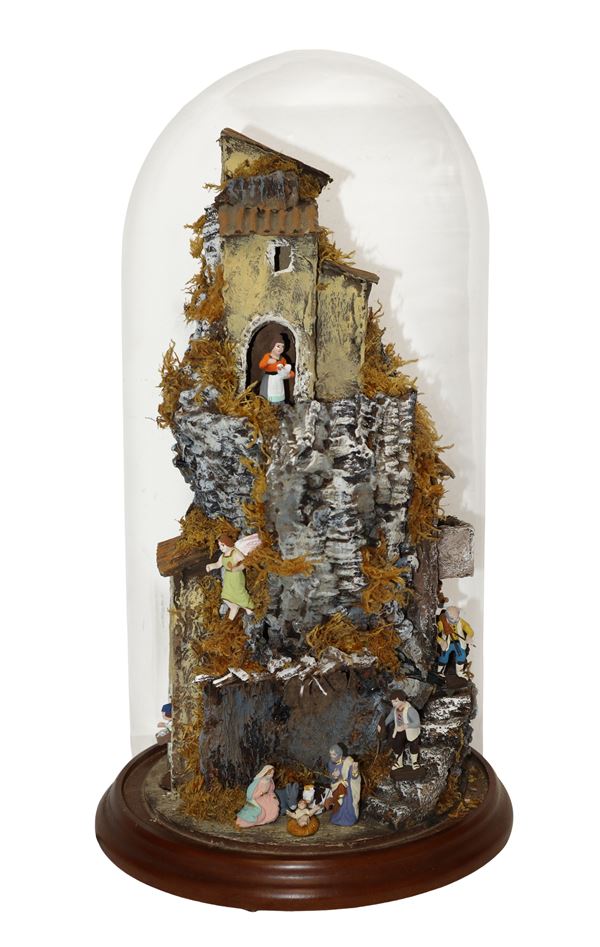 Produzione  Ferrigno - Nativity scene with figurines multi-storey village with lights in glass case