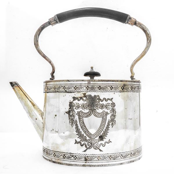 Sheffield teapot with decorations on front and back