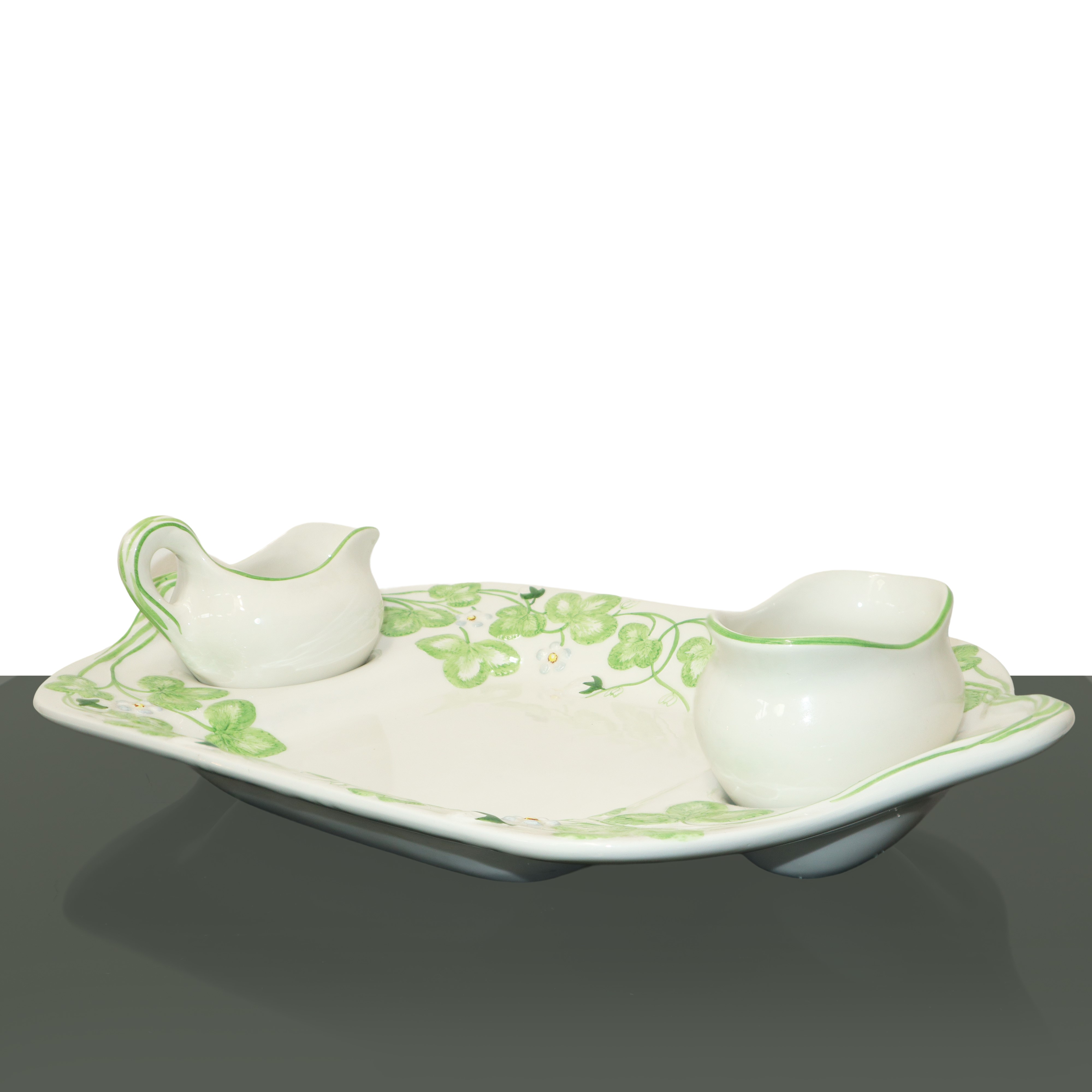 Piatto da portata con salsiere, decorazioni di fiori e foglie