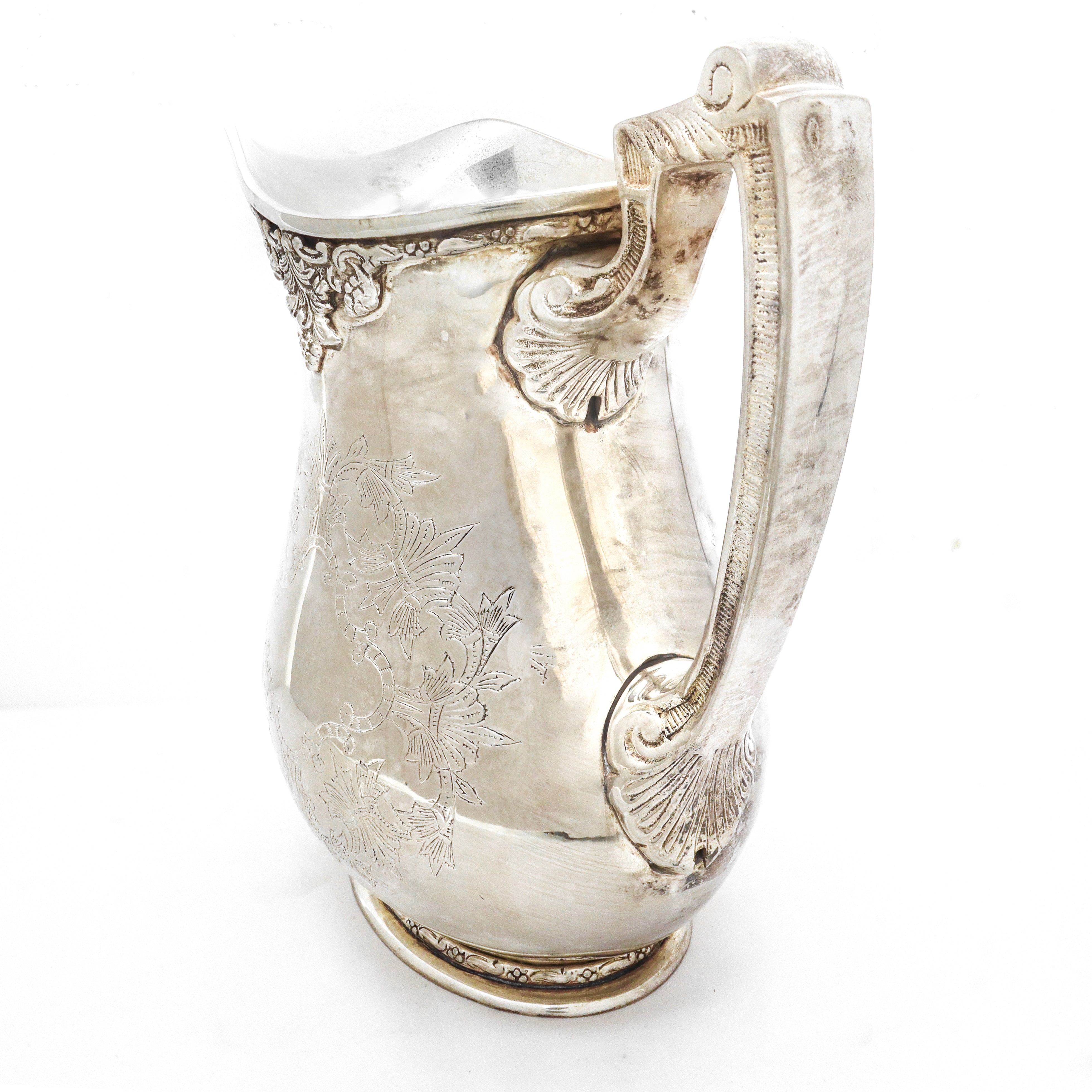 Brocca vittoriana in sheffield con decori sul fronte sul retro e sulla presa