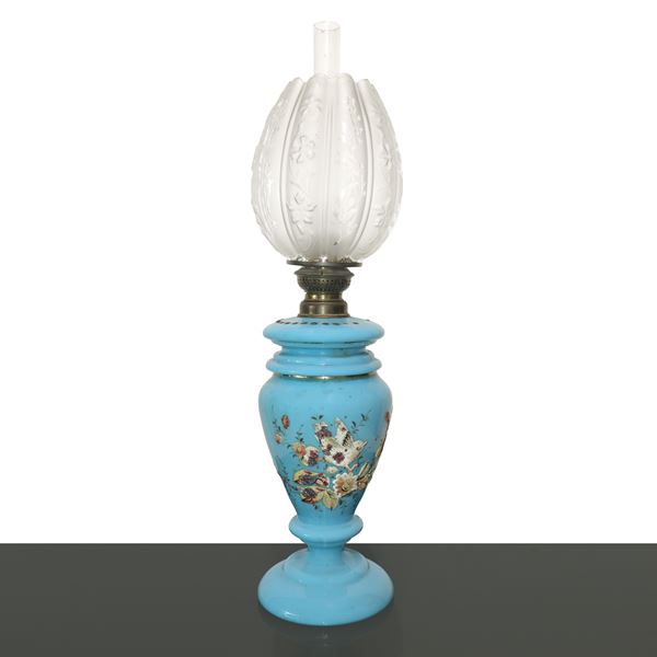 Oil lamp in polychrome painted opaline on a light blue base with bird and flowers