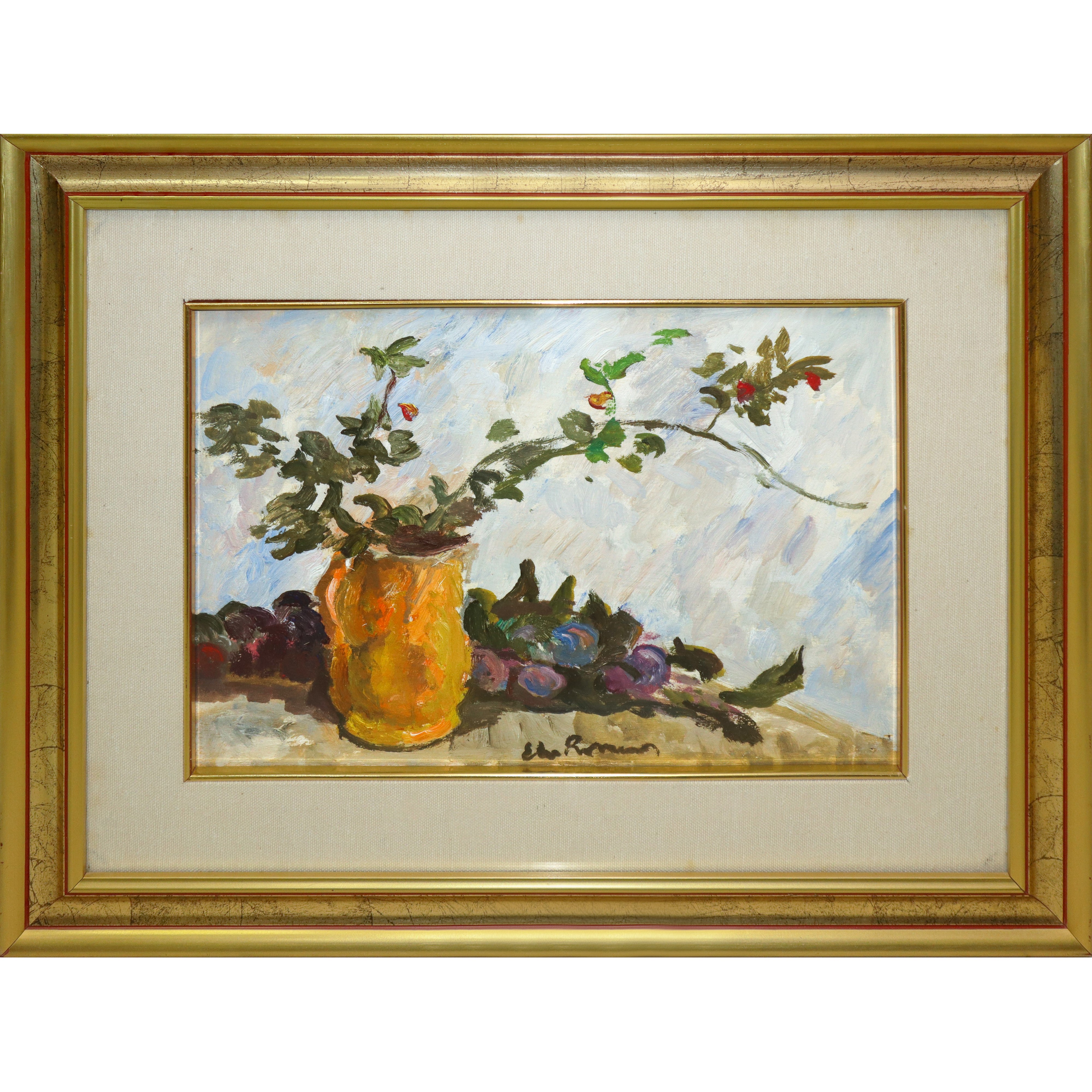 Vaso con rami e frutti