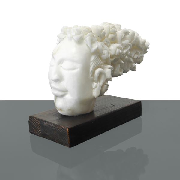 Michele Valenza - Woman&#39;s face with flower head