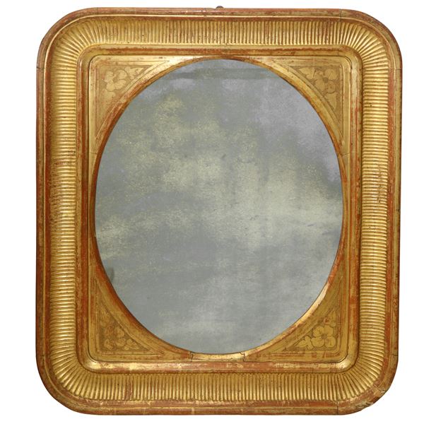 Mirror tray frame in gilded wood with leaf round corners pleated on the oval mirror