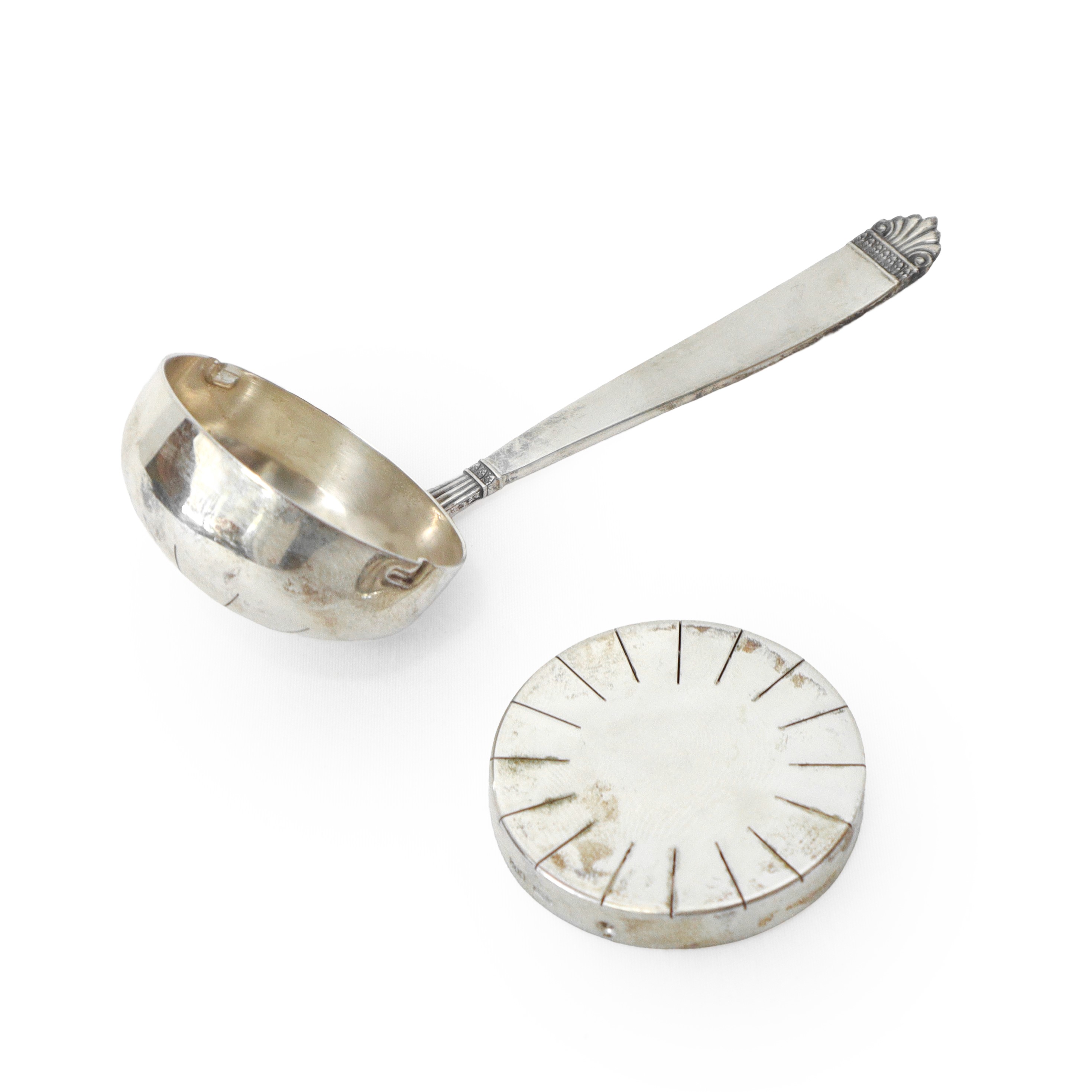 Cucchiaino spargizucchero in argento