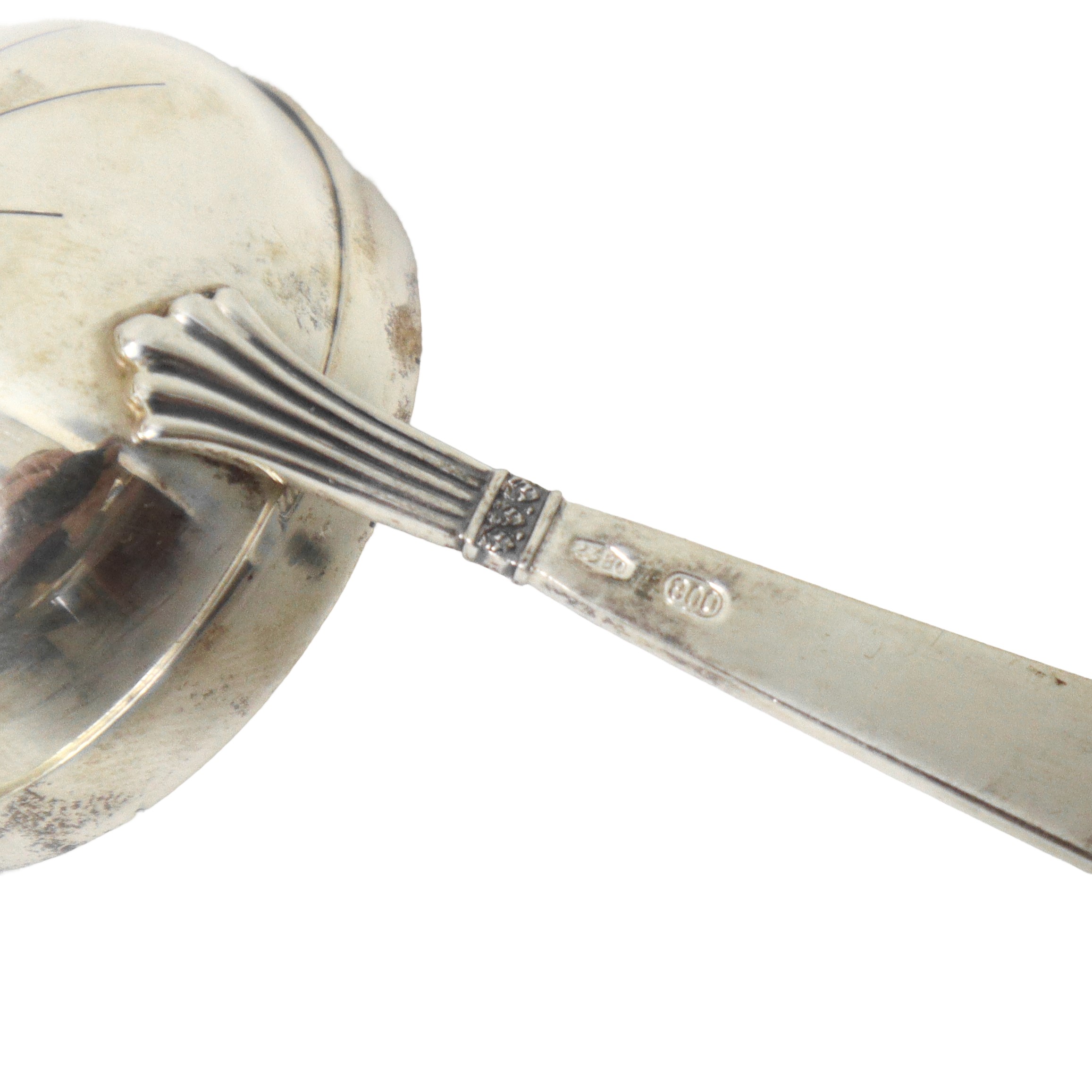 Cucchiaino spargizucchero in argento