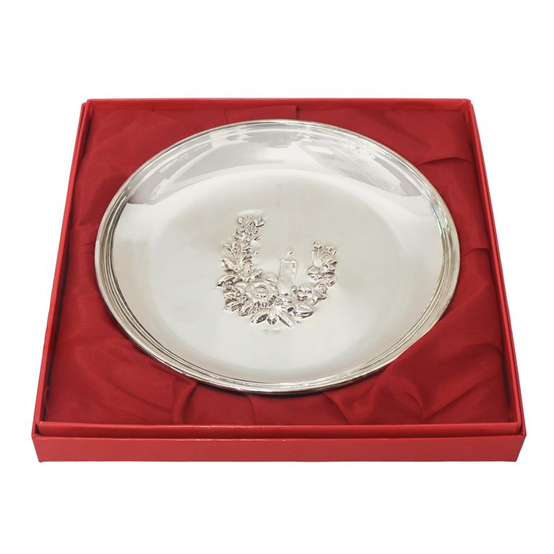 Piatto in argento 800 con decorazione a sbalzo