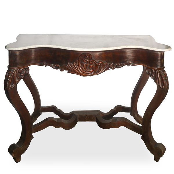 Louis Philippe console in walnut wood, marble on the top, carved front, curved carved legs connected to the base by crosspieces converging in the center