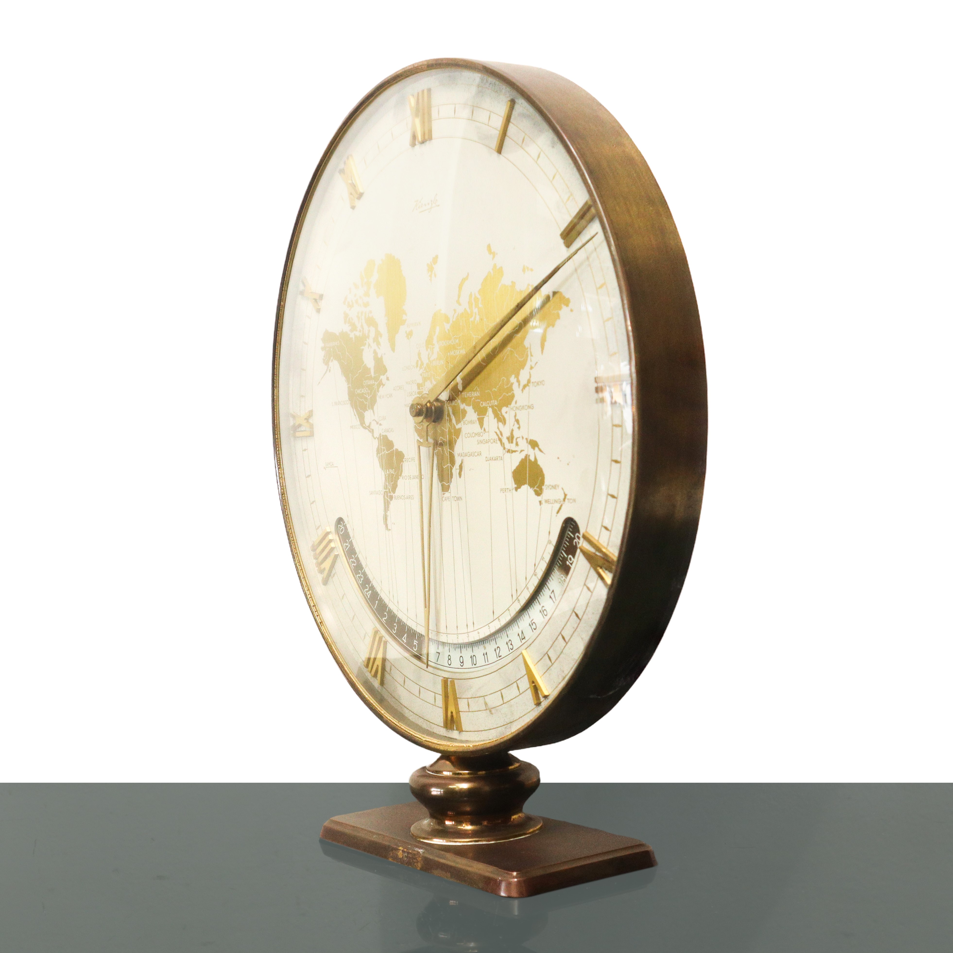 Orologio meccanico da tavolo con fuso orario mondiale