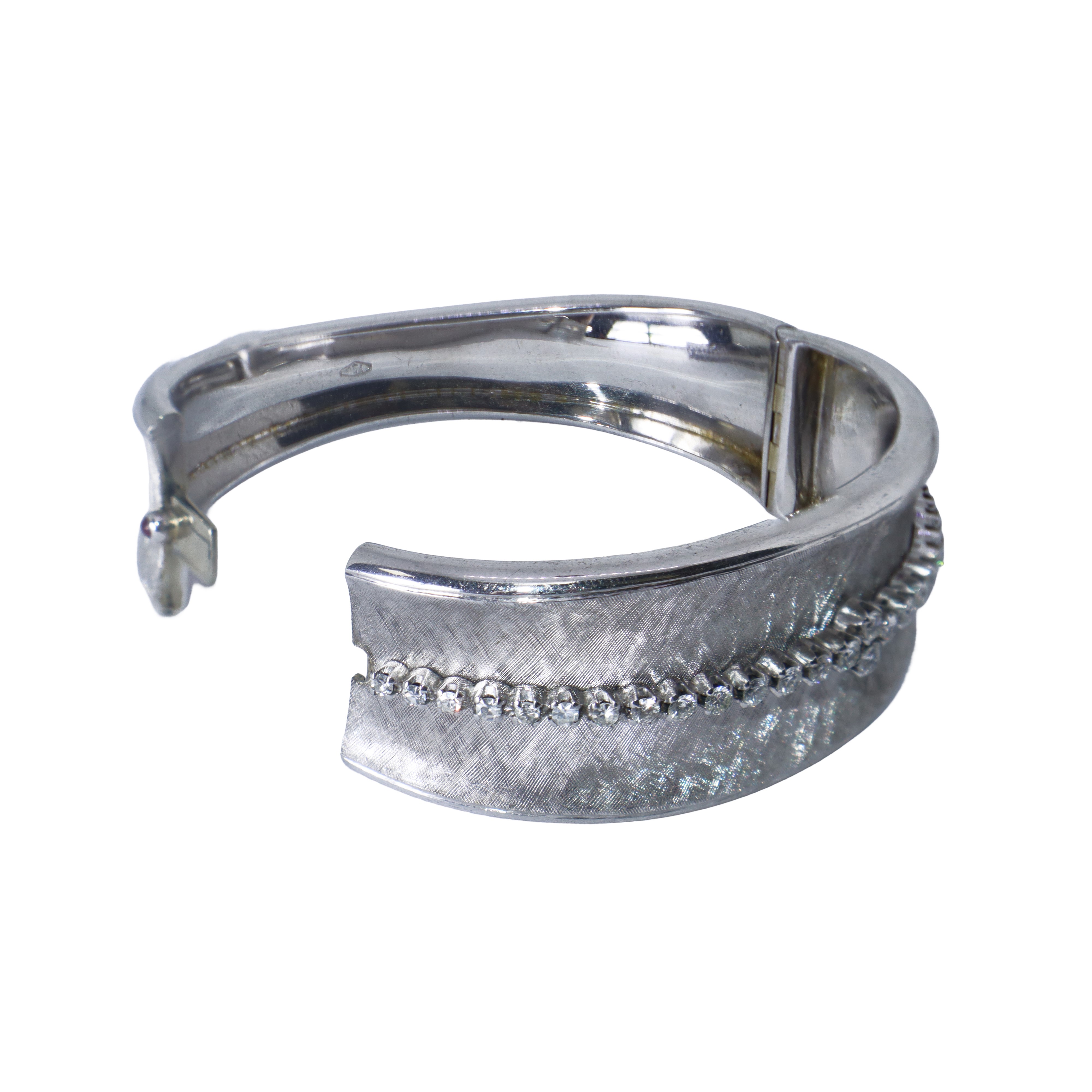 Bracciale rigido in oro bianco con diamanti