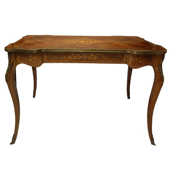 Napoleon III writing desk with central drawer and bronzes on the sides with top edged in gilded brass with light wood inlays