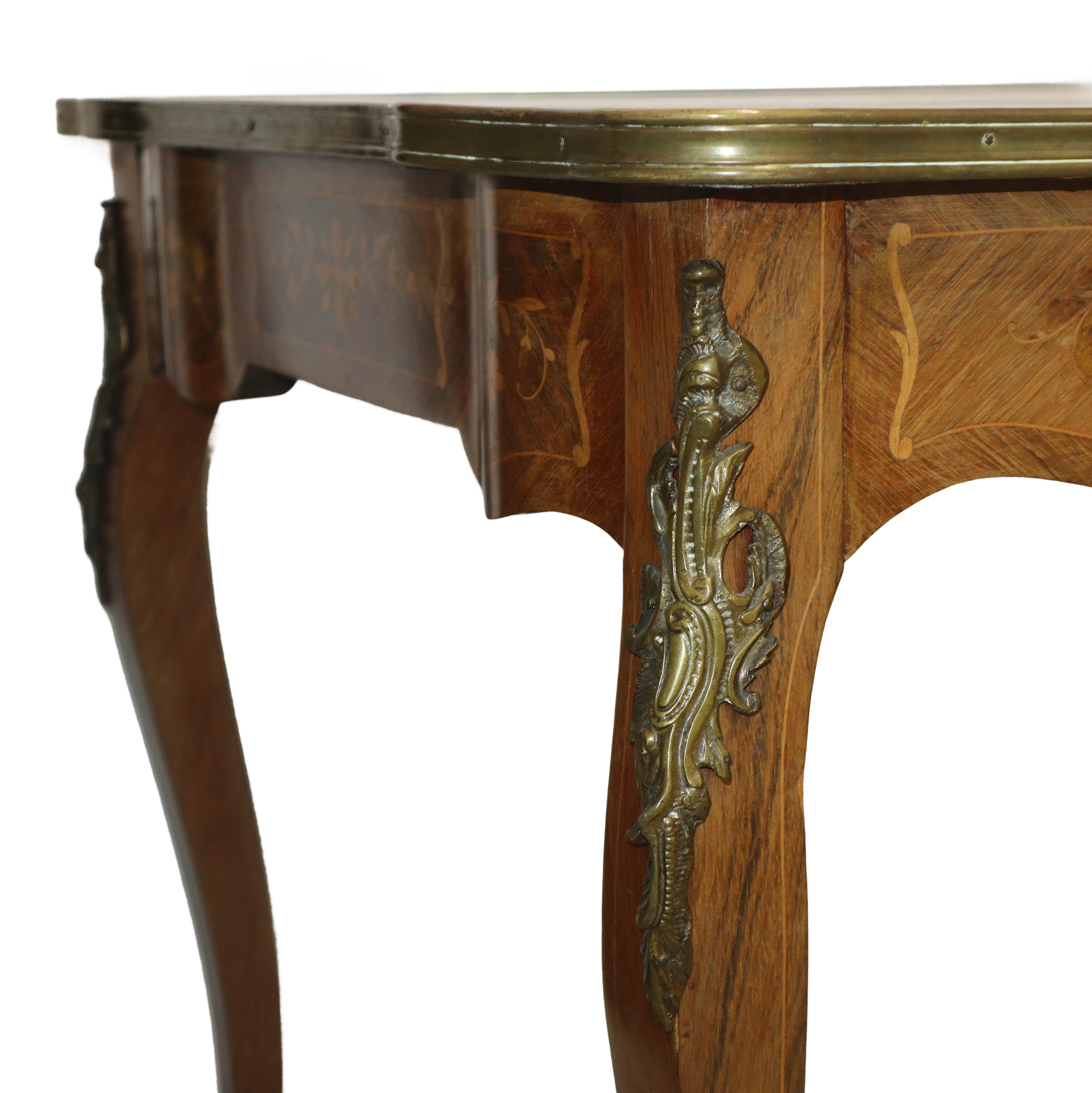 Scrittoio Napoleone III con cassetto centrale e bronzi ai lati con piano bordato in ottone dorato...