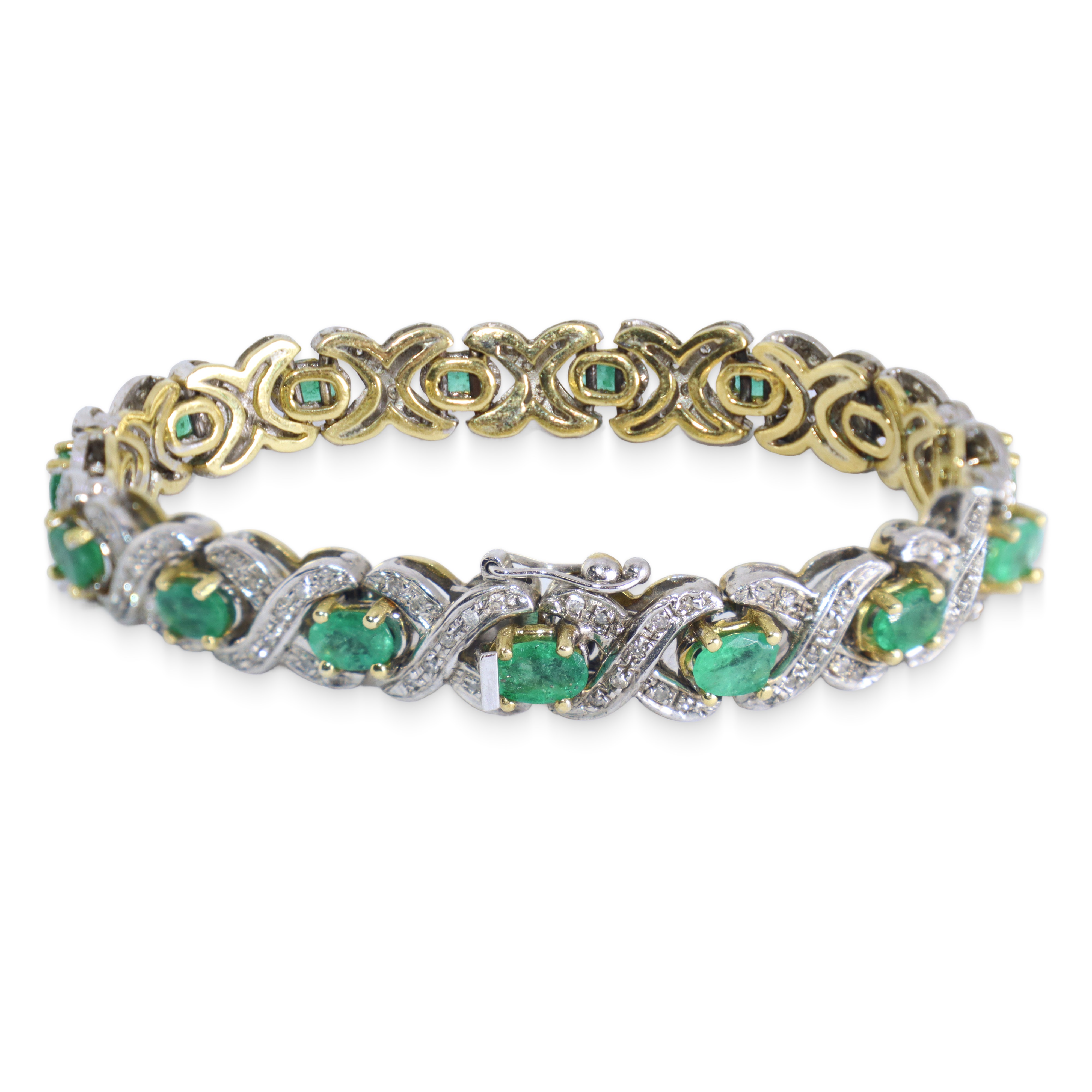 Bracciale tennis in oro bianco e oro giallo con diamanti e smeraldi