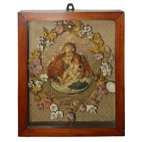 Noticeboard with Saint Joseph and Baby Jesus in wax with relics