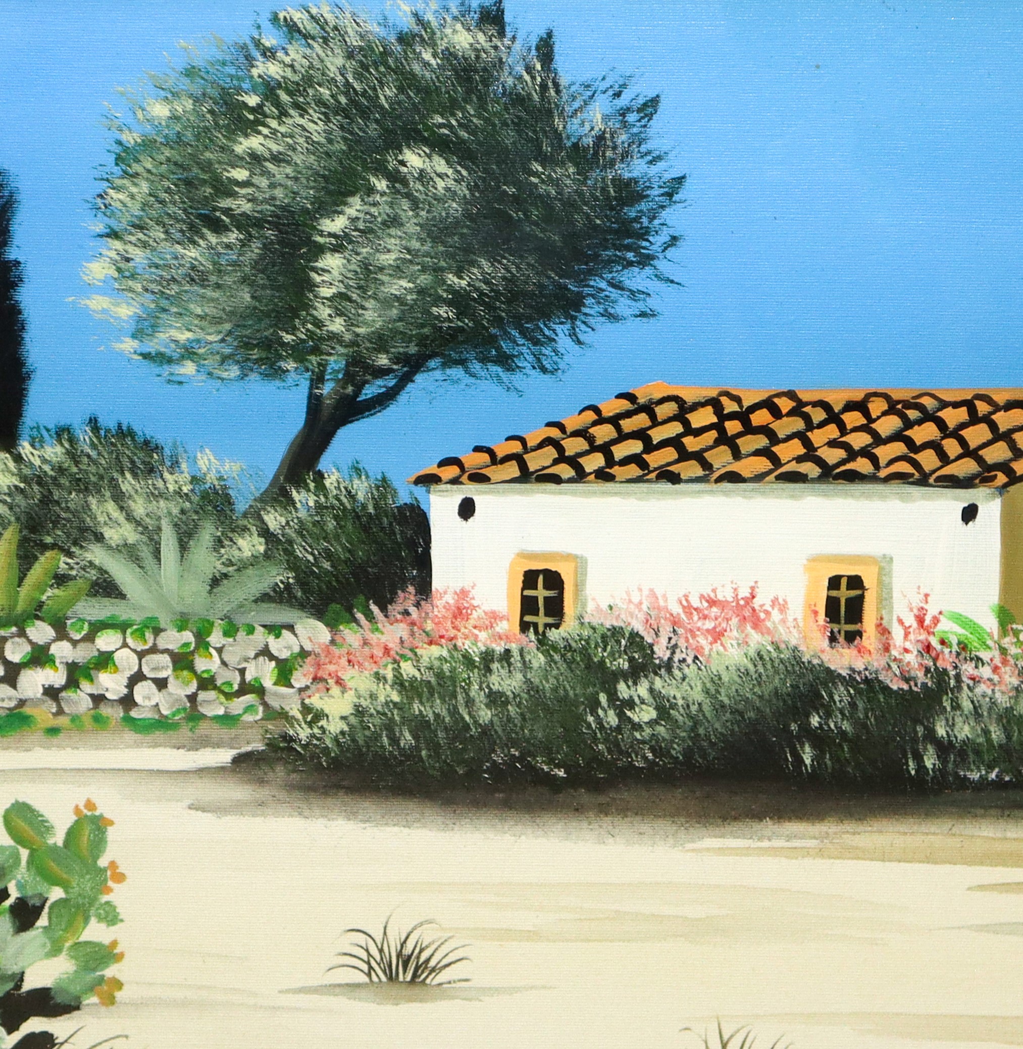 Casa con alberi e fichi d'india