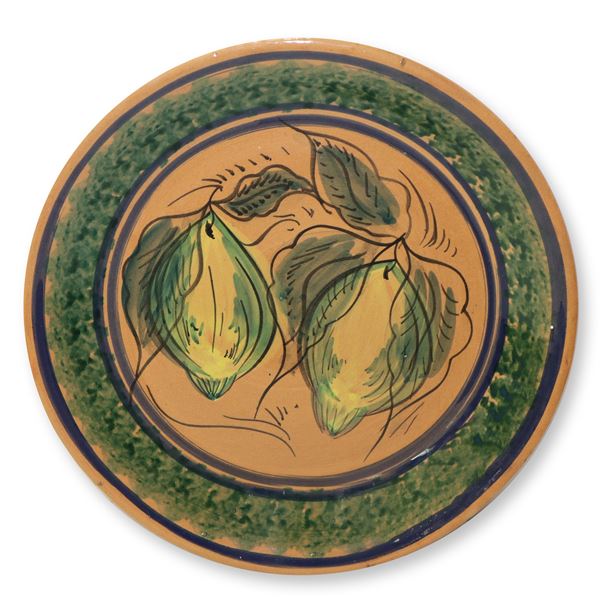 Caltagirone majolica plate enamelled and painted with depictions of cedars