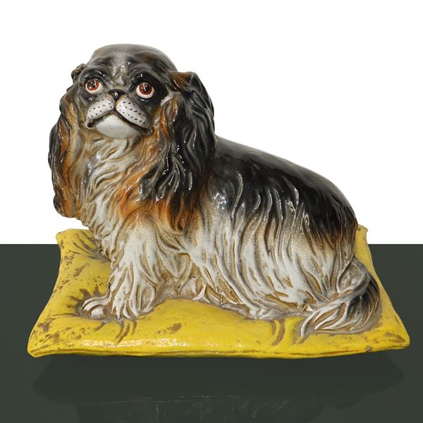 Pekingese in polychrome painted and enameled majolica