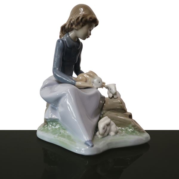 Nao Valencia - Little girl with rabbits