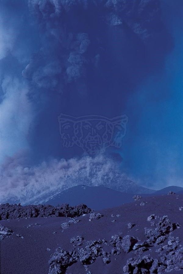 Collection EM, titled "Smoking", 2002. Etna eruption 2002 explosion with volcanic sand and fumaroles at the base of the new crater, slide 1/8, 30x45, cibachrome slide by direct printing, 40x55 forex 10mm, Contouring white, cardboard, coating edges volcanic sand