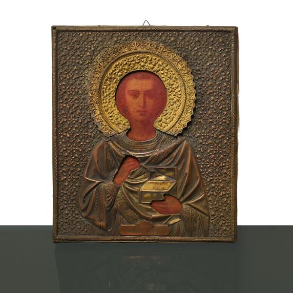 Russian icon with chiseled and embossed copper riza depicting Saint Pantaleon