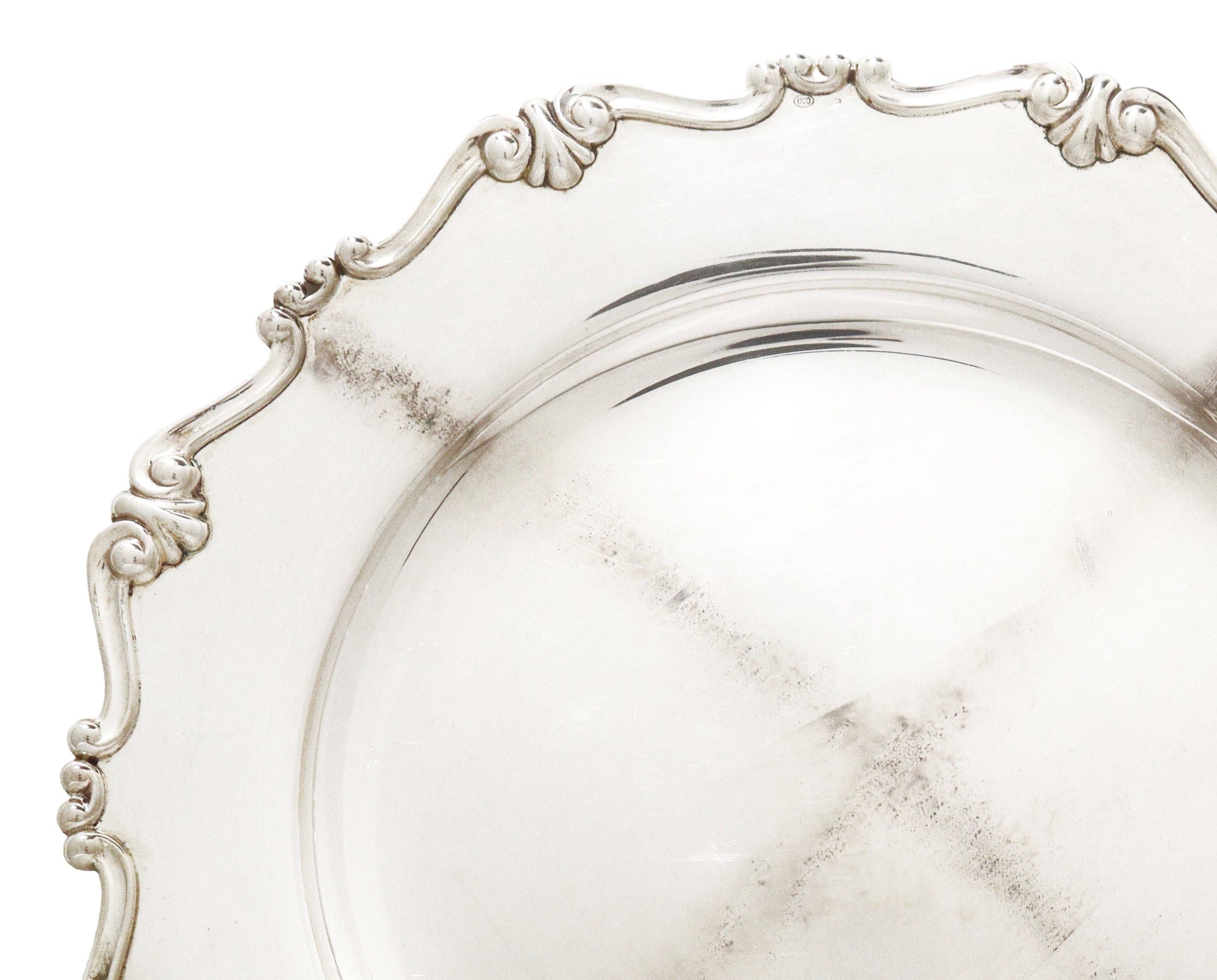 Piatto in argento 800 con bordo smerlato