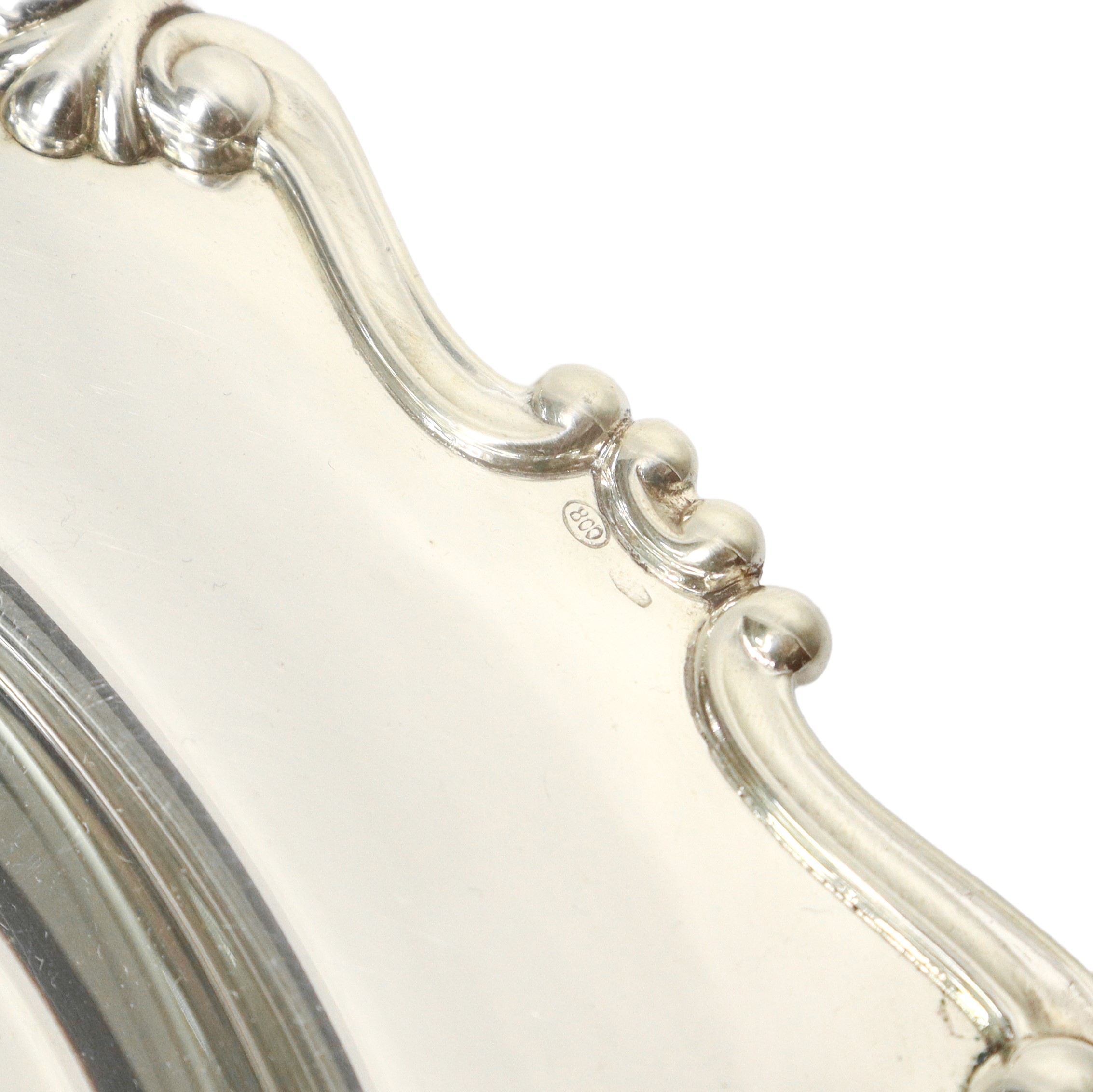 Piatto in argento 800 con bordo smerlato