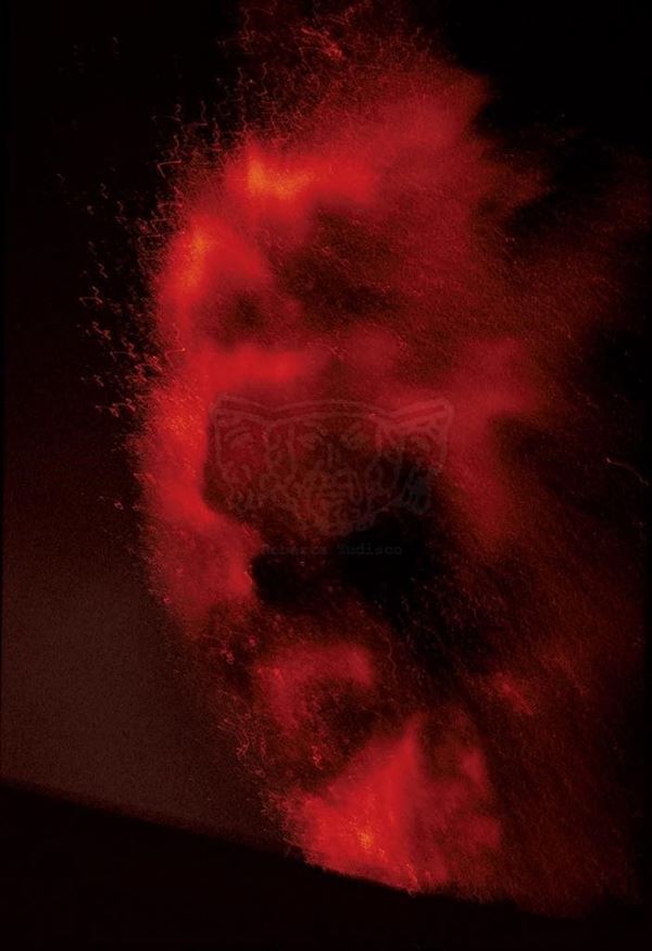 Collection EM, titled "Bomb", 2002. Etna eruption in 2002, lava explosion, slide 2/8, 30x45, cibachrome slide by direct printing, 40x55 forex 10mm, Contouring white, cardboard, cover edges volcanic sand