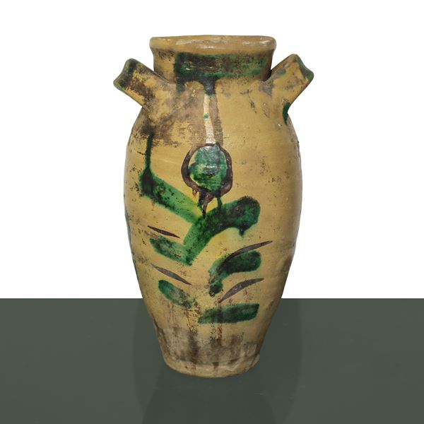 Caltagirone majolica vase with lateral handles decorated with glaze and green enamel