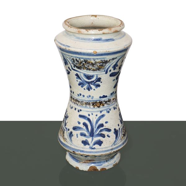 Albarello in Caltagirone majolica hand-decorated in blue and manganese tones with floral motifs