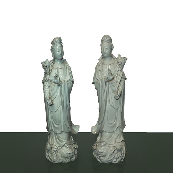 Pair of guanin blanc de chine with lotus flower