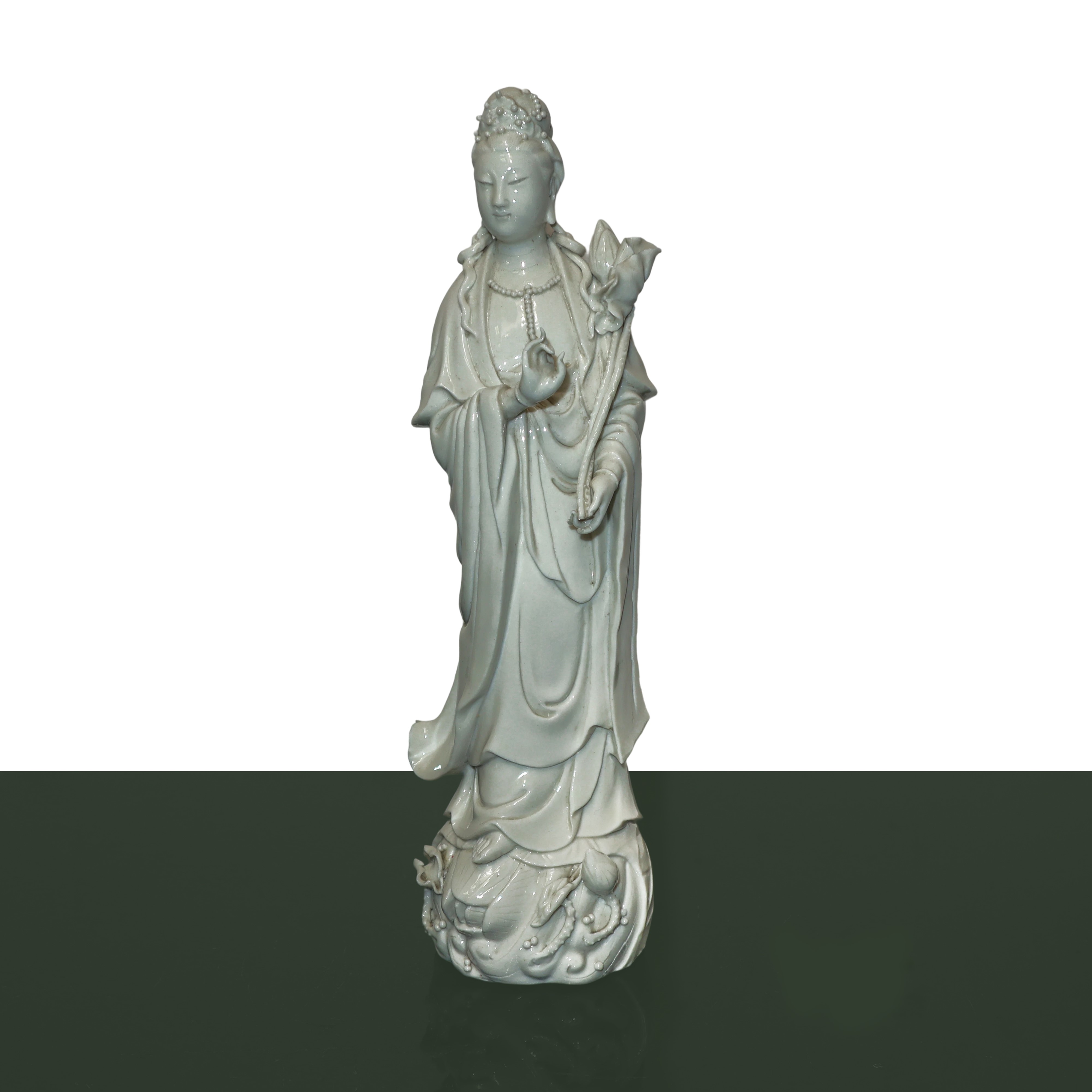Coppia di guanin blanc de chine con fiore di loto