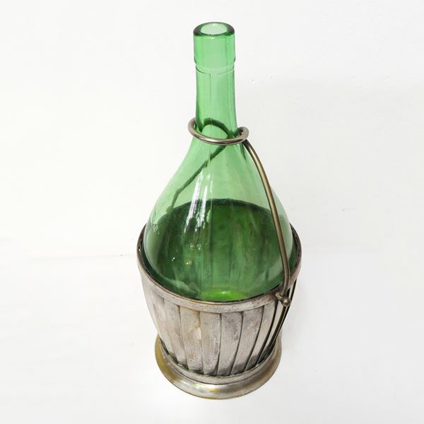 Green glass bottle with brass lining