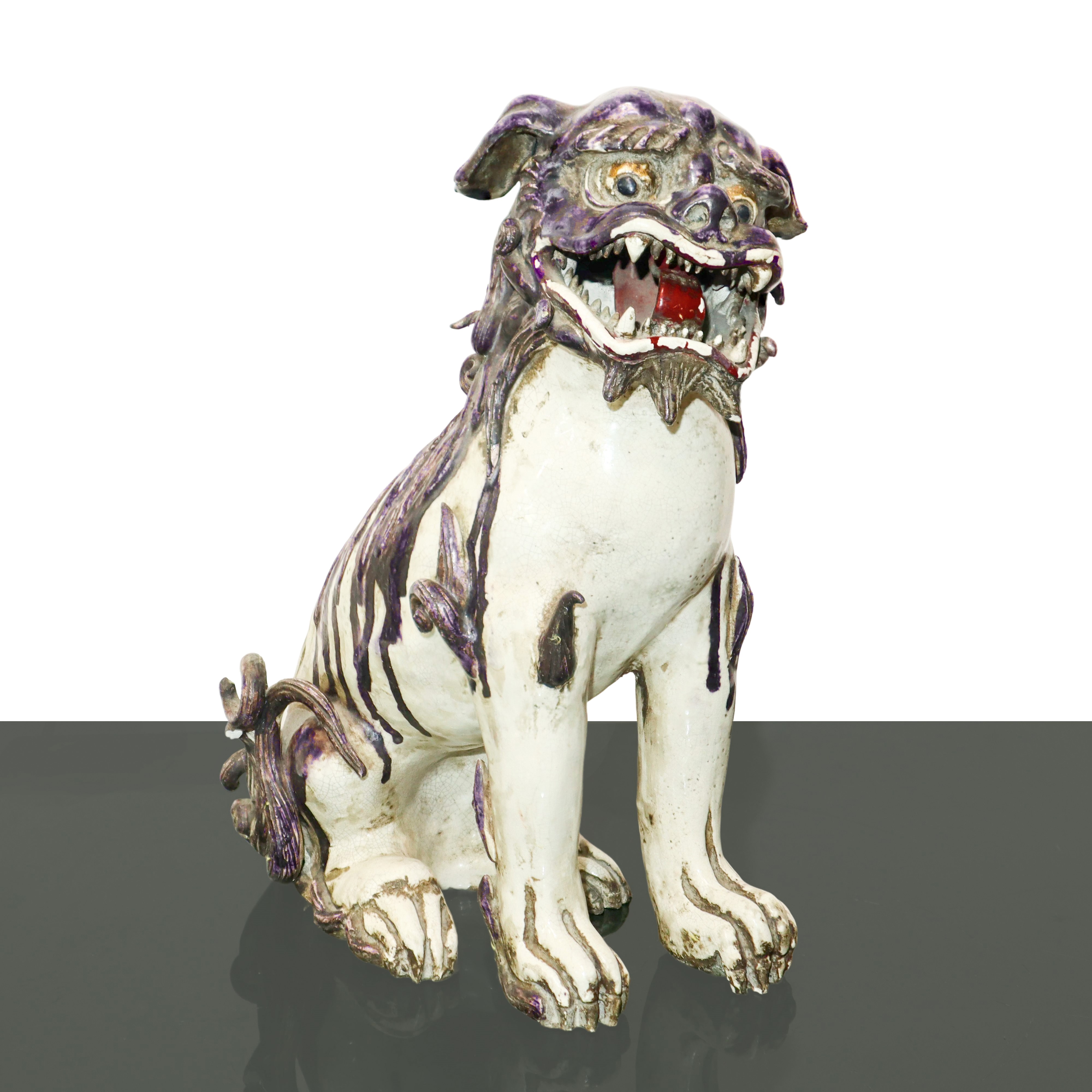 Coppia di cani di Fo in biscuit smaltato bianco e viola