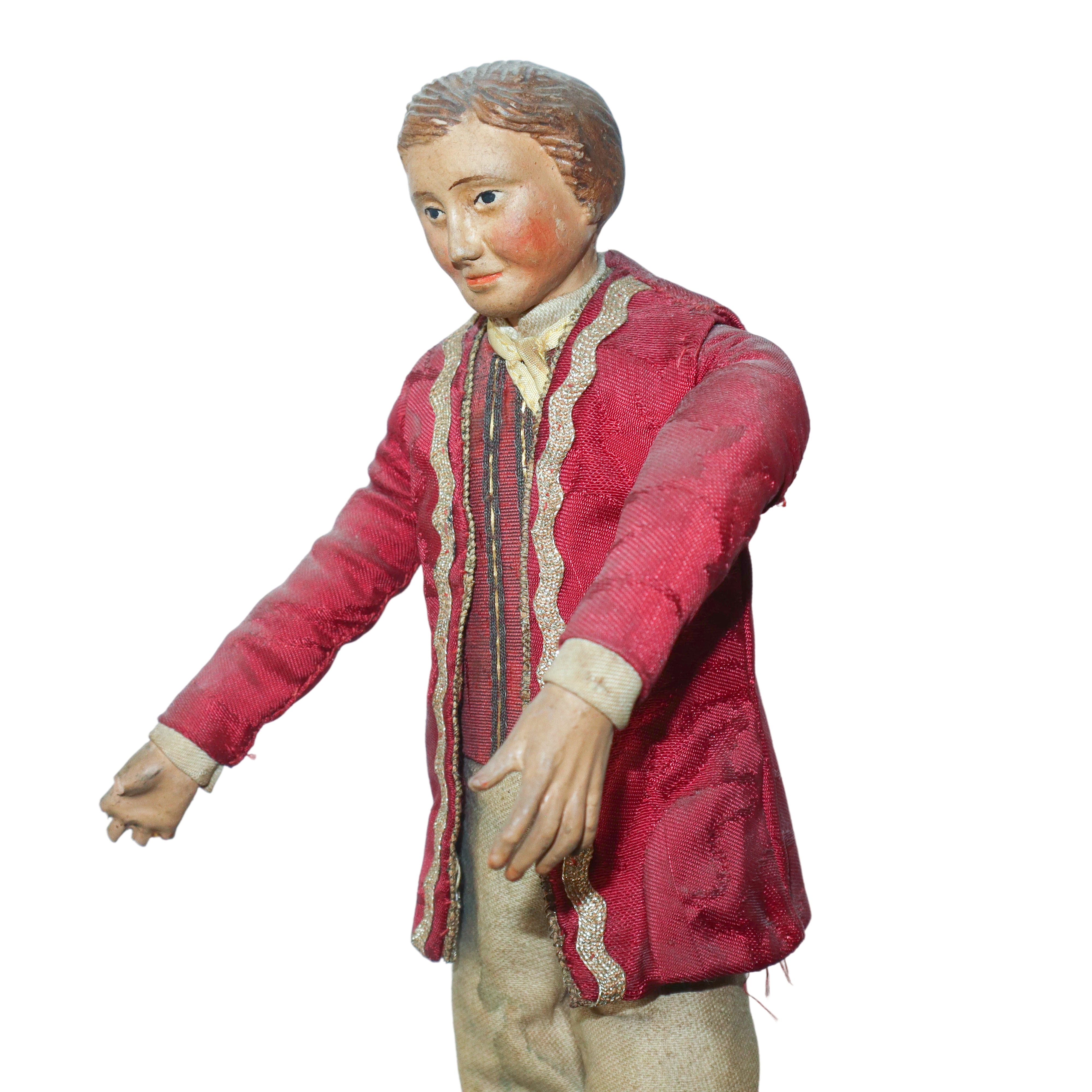 Personaggio Presepiale in Terracotta e Legno con Vesti in Cotone, Raso e Passamaneria: Giovane No...