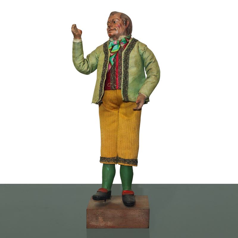 Personaggio presepiale, uomo calvo con giubbotto color cammello, terracotta e legno, Napoli XIX s...