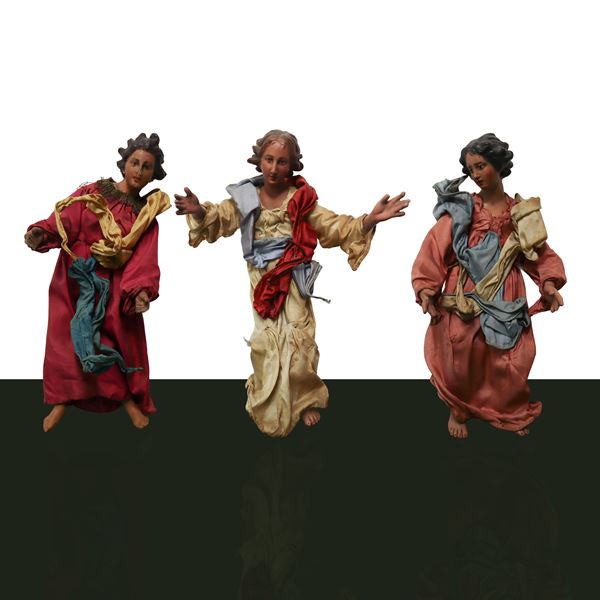 No. 3 terracotta and wooden nativity angels with cotton, satin and trimmings clothes