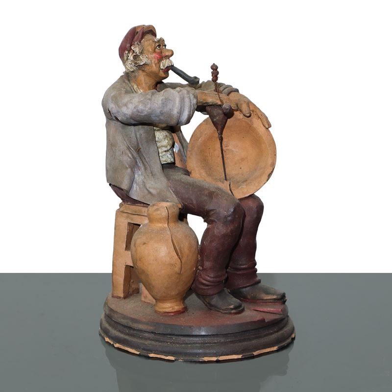 SCULTURA IN TERRACOTTA ARTIGIANATO PALERMITANO: riparatore di vasi