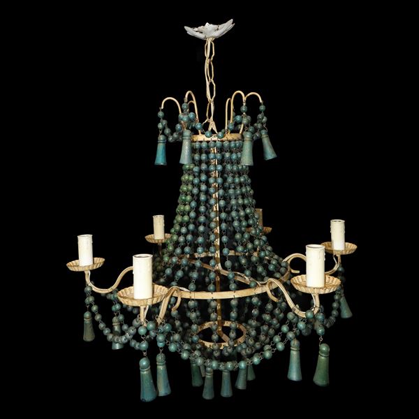 6-light chandelier with gold metal frame and green wooden ball-shaped brindoli