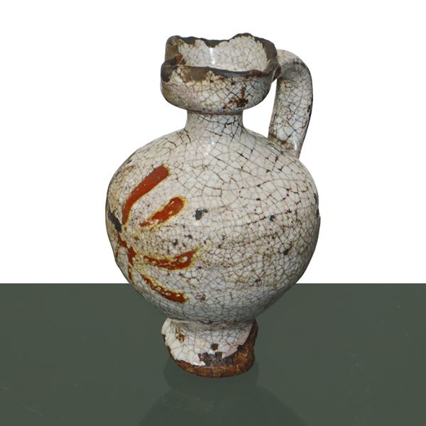 Jar with handle in Caltagirone majolica, glazed, decorated and enamelled in polychrome white paste