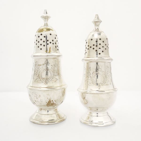 Pair of salt shakers in EPNS decorated with embossing