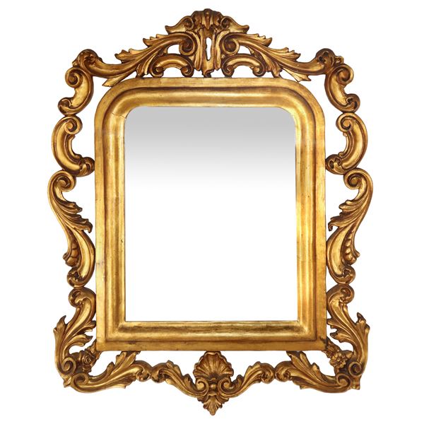 Baroque style mirror in gilded wood with side friezes 