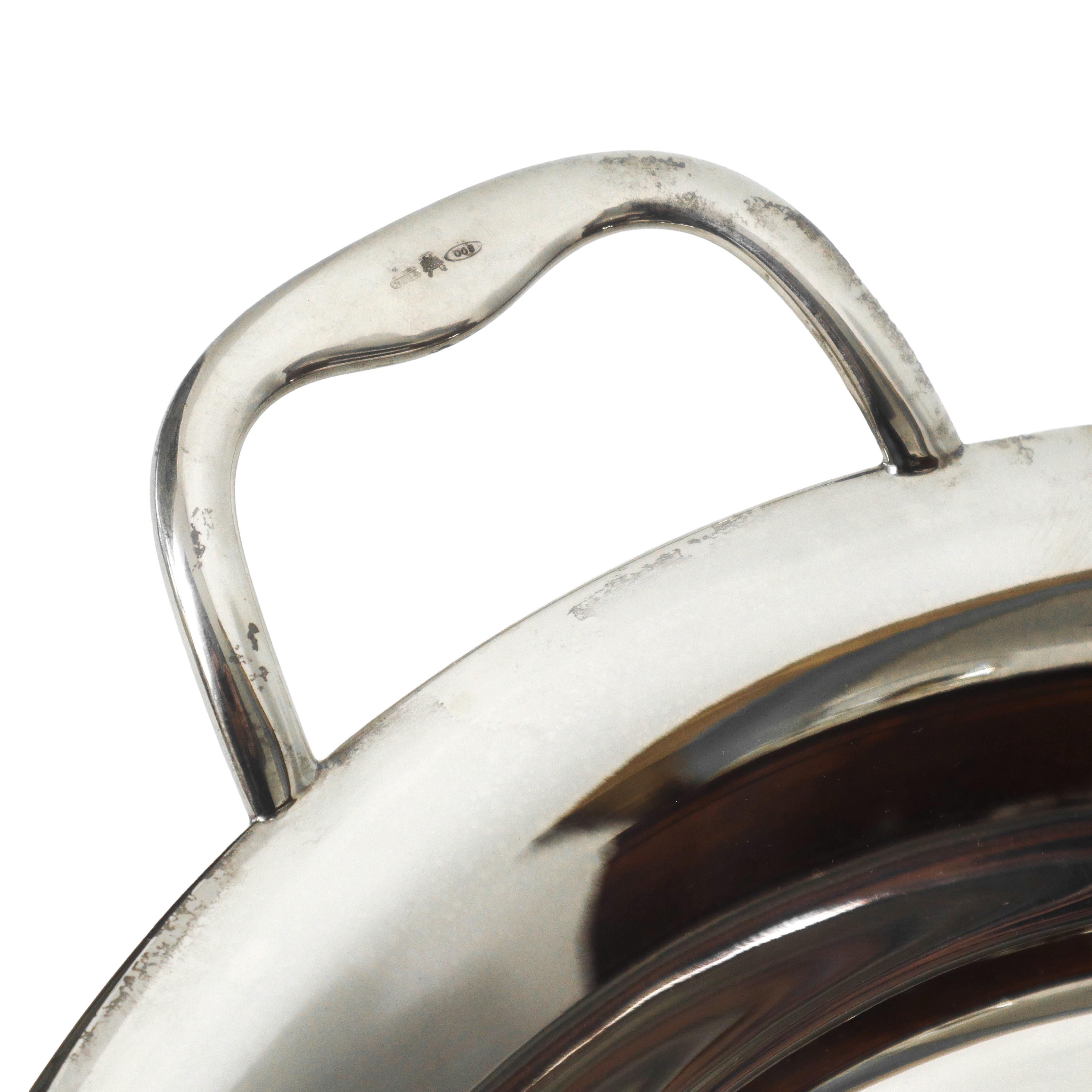 Vassoio circolare in argento 800 con prese laterali