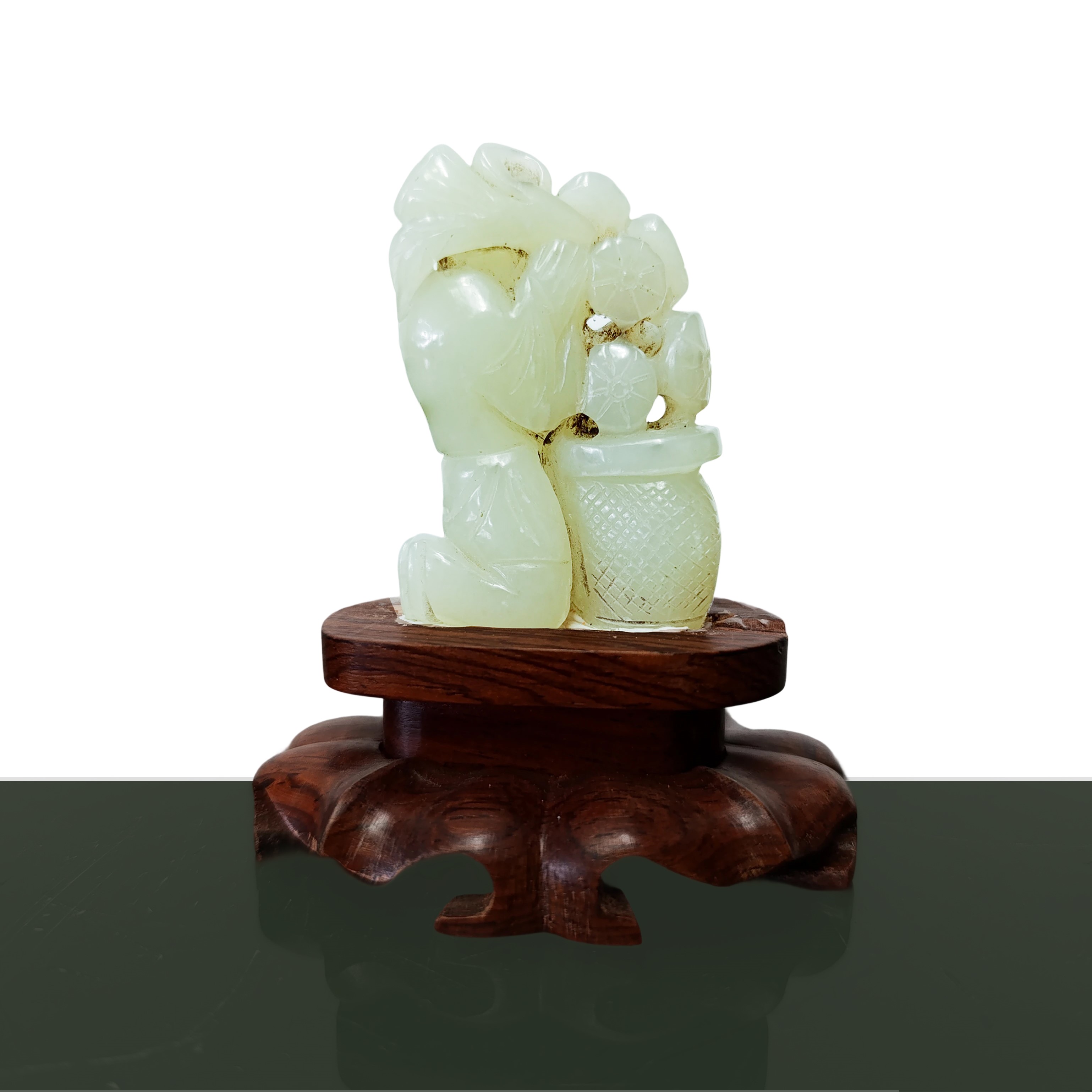 Guanin in giada verde intagliata