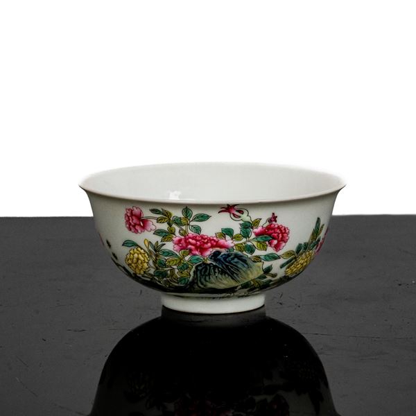 Pink famille bowl with floral motif decorations