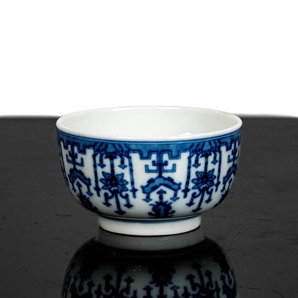 Cup with blue decorations