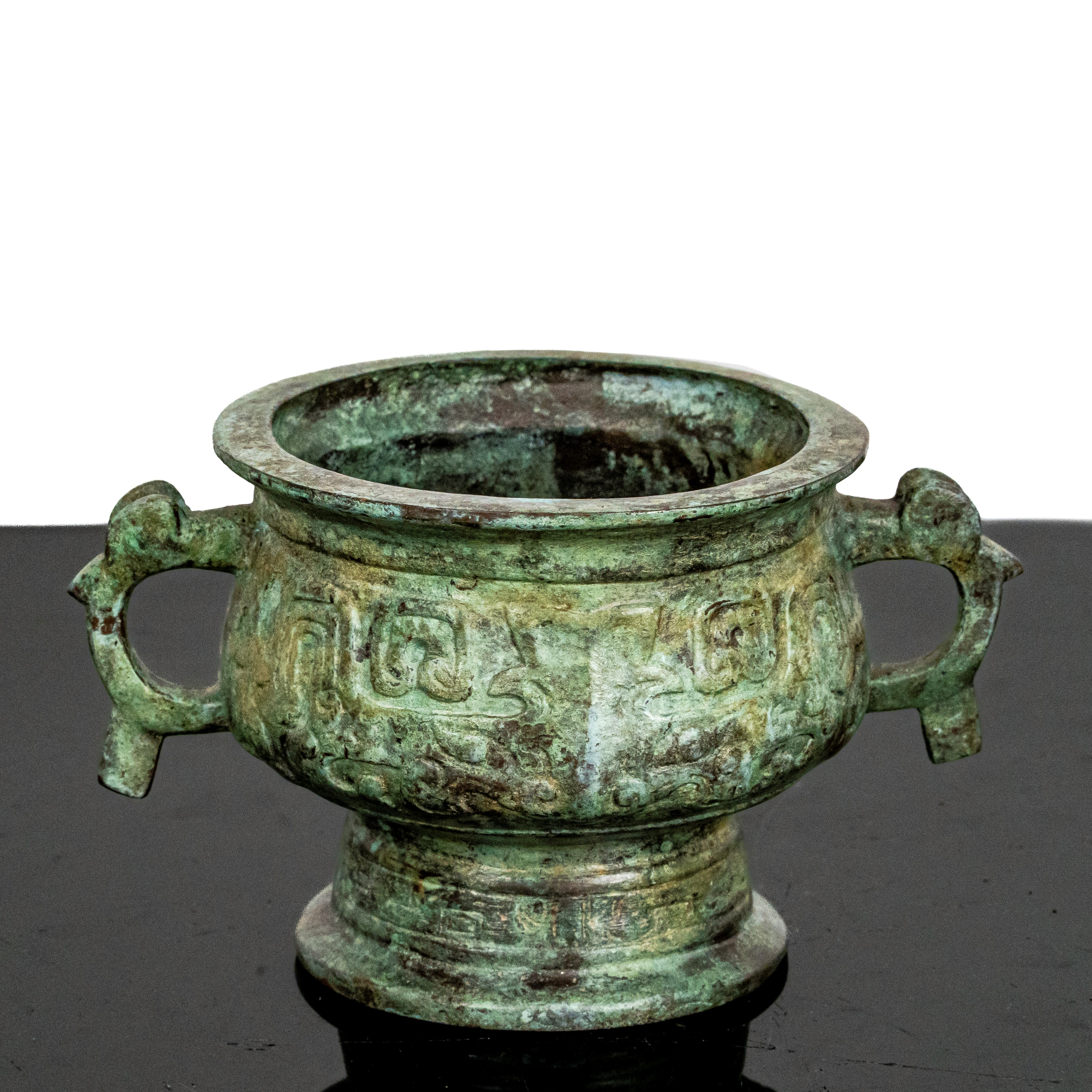 Bruciatore di incenso in rame con decori a rilievo