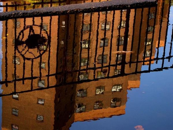 Collection AQUA, titled "Close up", 2006. USA: NYC, Reflection Peter Cooper Village with red brick buildings of the puddle of rainwater (detail), digital 0/5, 30,5X39, digital printing on photo paper mat kodak, forex black 20mm, edged